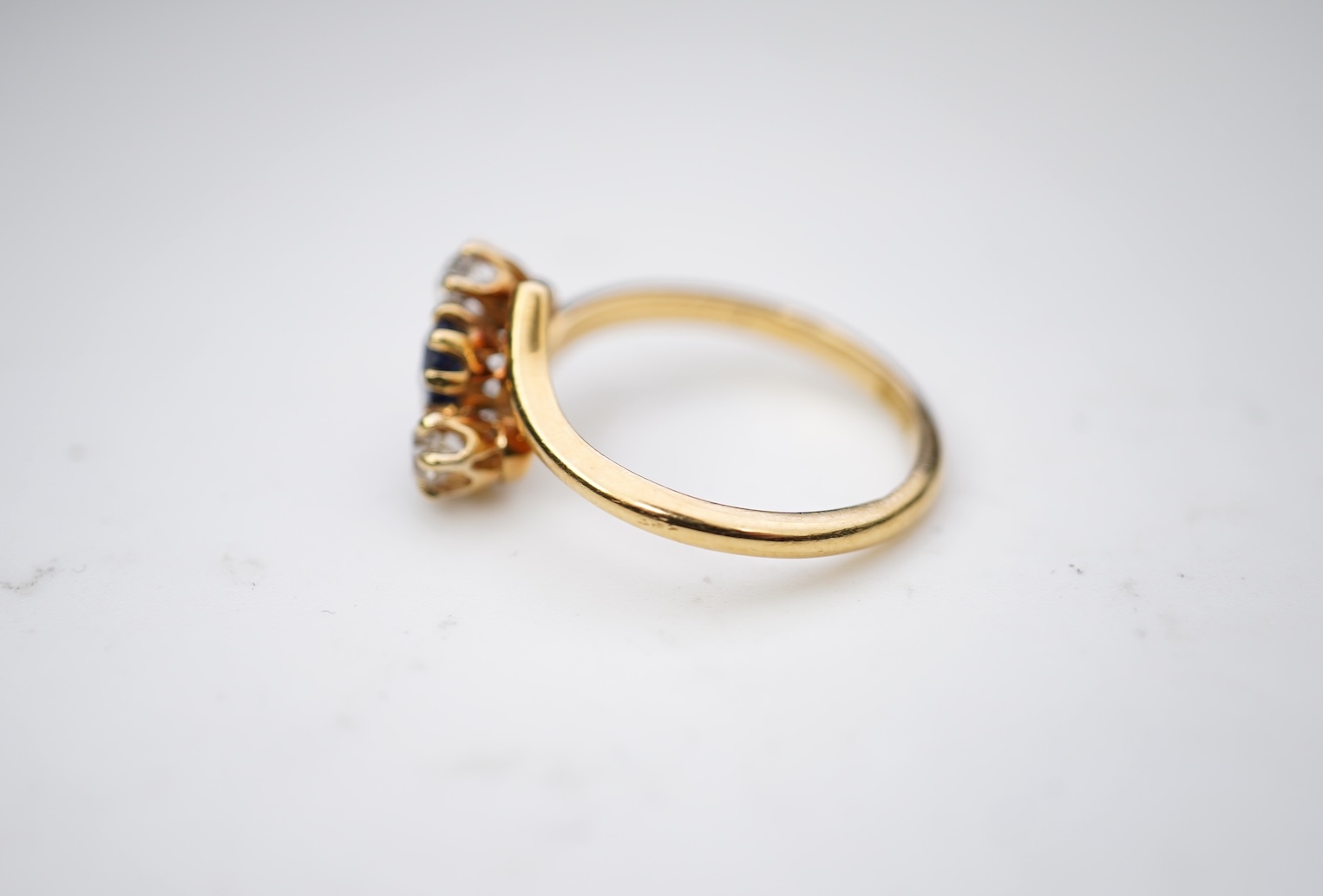 A sapphire and diamond three-stone ring, early 20th century